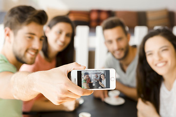 Image showing Group selfie at the coffee shop