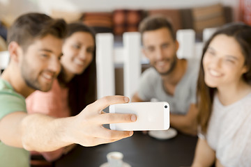 Image showing Group selfie at the coffee shop