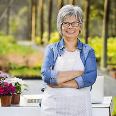 Image showing Working in a flower shop