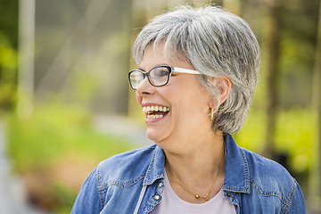 Image showing Mature woman laughing