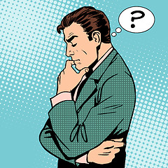 Image showing Thinking businessman questions
