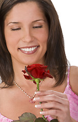 Image showing Portrait of a girl with a red rose