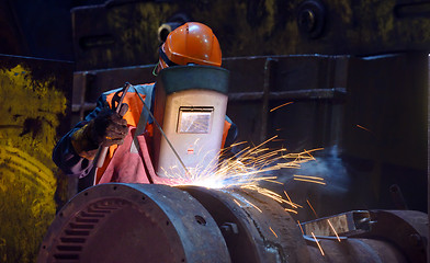 Image showing welder is welding 