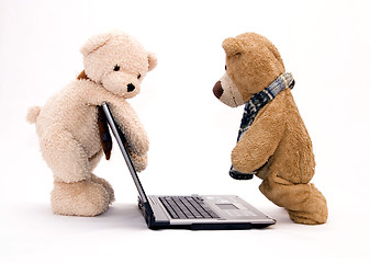 Image showing Laptop and teddy bear