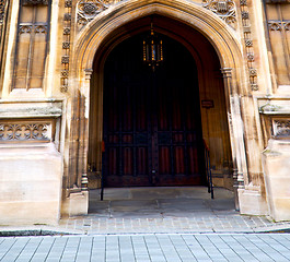 Image showing parliament in london old church door and marble antique  wall