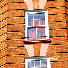 Image showing in europe london old red brick wall and      historical window