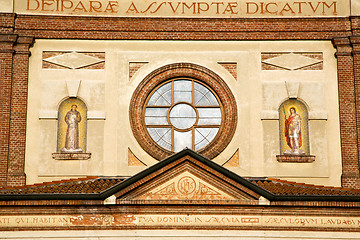 Image showing rose      in  the parabiago old   church   closed brick   tower 