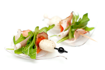 Image showing Stand-up snack canape with bacon and mozzarella