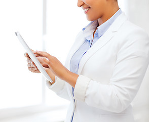 Image showing businesswoman with tablet pc in office