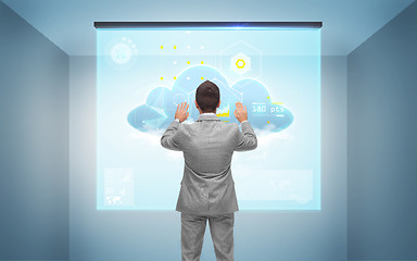 Image showing businessman working with virtual screen