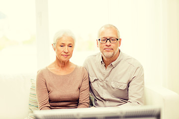 Image showing senior couple watching tv at home