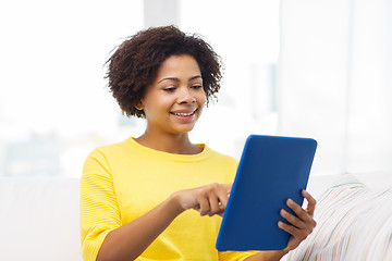 Image showing happy african american woman with tablet pc