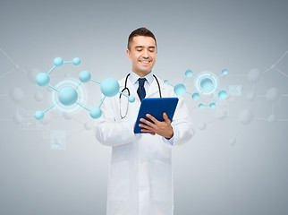 Image showing male doctor with tablet pc and molecule formula