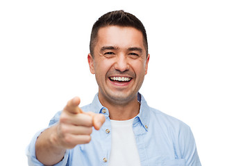 Image showing smiling man pointing finger on you