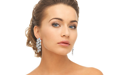 Image showing woman wearing shiny diamond earrings