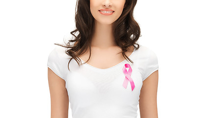 Image showing smiling woman with pink cancer awareness ribbon