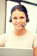 Image showing helpline operator with laptop computer