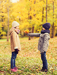 Image showing smiling children in autumn park