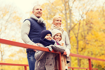 Image showing happy family in autumn park