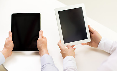 Image showing close up of businessman hands with tablet pc