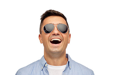 Image showing face of smiling man in shirt and sunglasses