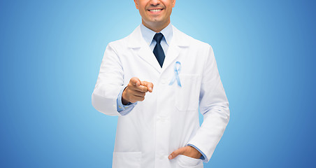 Image showing happy doctor with prostate cancer awareness ribbon