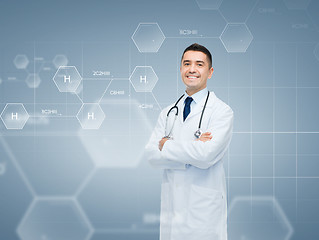 Image showing smiling male doctor over chemical formula