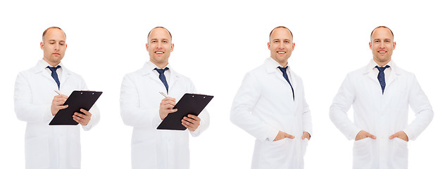 Image showing happy doctors with clipboard and stethoscope