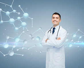 Image showing smiling male doctor over molecule formula