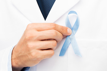 Image showing doctor hand with prostate cancer awareness ribbon