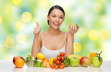 Image showing happy woman with healthy food showing thumbs up