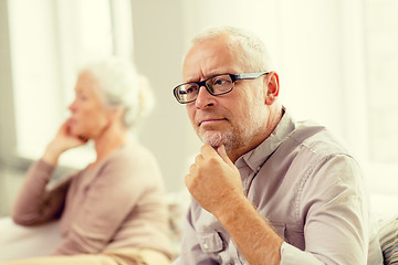 Image showing senior couple sitting on sofa at home