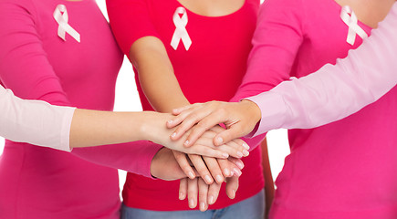 Image showing close up of women with cancer awareness ribbons