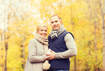Image showing smiling couple in autumn park
