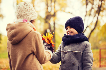 Image showing smiling children in autumn park