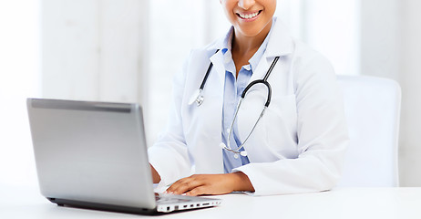 Image showing female doctor with laptop pc