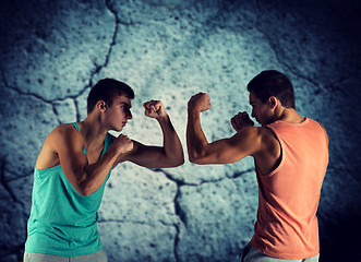 Image showing young men fighting hand-to-hand