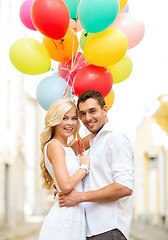 Image showing couple with colorful balloons