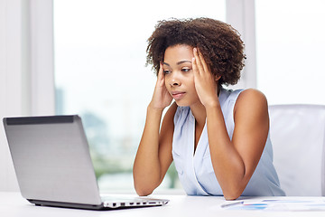 Image showing african woman with laptop at office