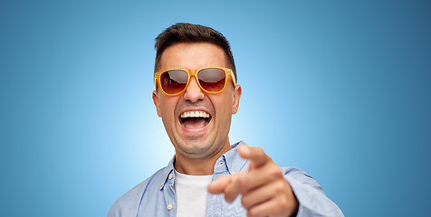 Image showing face of laughing man in shirt and sunglasses