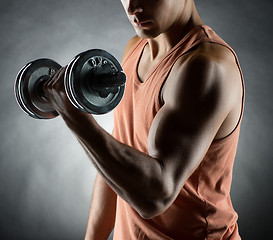 Image showing young man with dumbbell