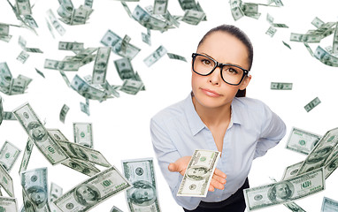 Image showing businesswoman with money over blue background