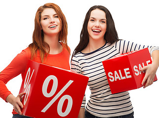 Image showing smiling teenage girl with percent and sale sign