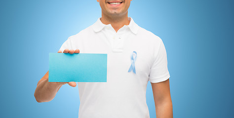 Image showing man with prostate cancer awareness ribbon and card