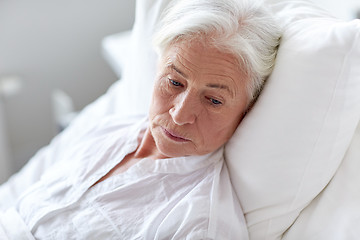 Image showing senior woman patient lying in bed at hospital ward