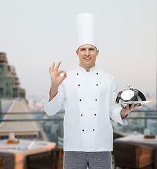 Image showing happy male chef cook with cloche showing ok sign