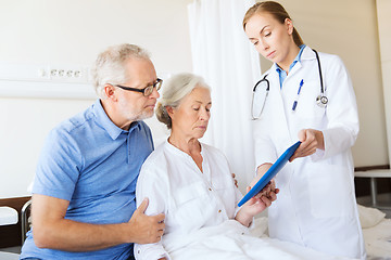 Image showing senior woman and doctor with tablet pc at hospital