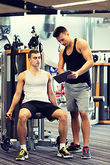 Image showing man exercising on gym machine