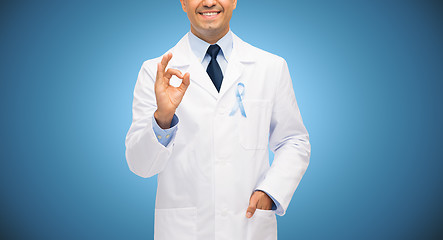 Image showing happy doctor with prostate cancer awareness ribbon