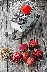 Image showing Christmas card with sleigh and ornaments